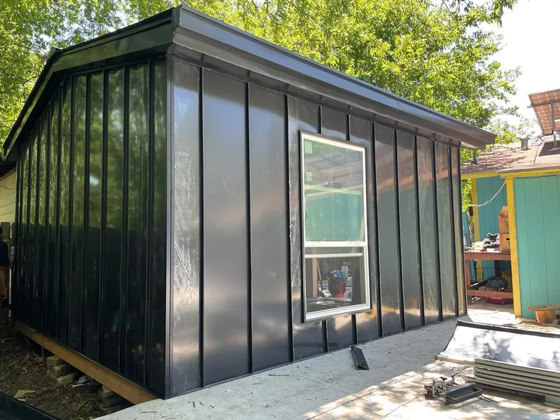 Black standing seam metal wall panels for Roof Inspection in Brown Deer